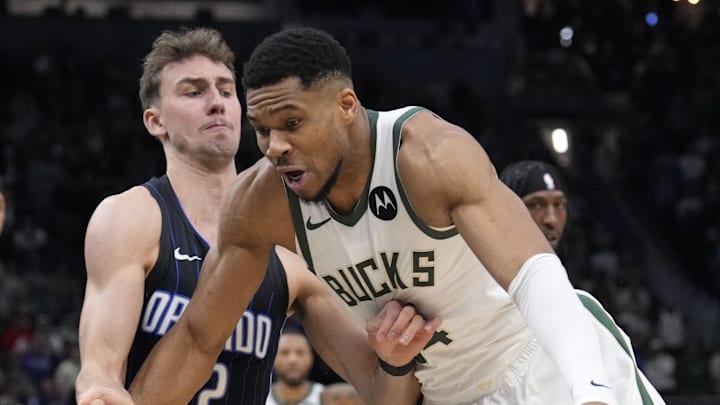 Mar 8, 2025; Milwaukee, Wisconsin, USA; Milwaukee Bucks forward Giannis Antetokounmpo (34) drives against Orlando Magic forward Franz Wagner (22) in the first half at Fiserv Forum. Mandatory Credit: Michael McLoone-Imagn Images Mar 8, 2025; Milwaukee, Wisconsin, USA; Milwaukee Bucks forward Giannis Antetokounmpo (34) drives against Orlando Magic forward Franz Wagner (22) in the first half at Fiserv Forum. Mandatory Credit: Michael McLoone-Imagn Images