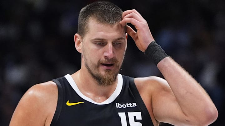 Nov 17, 2025; Denver, Colorado, USA; Denver Nuggets center Nikola Jokic (15) reacts in the second quarter against the Chicago Bulls at Ball Arena. Mandatory Credit: Ron Chenoy-Imagn Images Nov 17, 2025; Denver, Colorado, USA; Denver Nuggets center Nikola Jokic (15) reacts in the second quarter against the Chicago Bulls at Ball Arena. Mandatory Credit: Ron Chenoy-Imagn Images