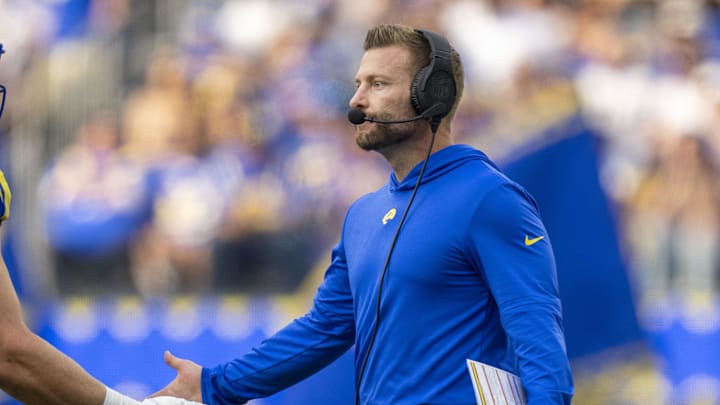 October 15, 2023; Inglewood, California, USA; Los Angeles Rams head coach Sean McVay (right) high-fives defensive end Jonah Williams (92) during the second quarter against the Arizona Cardinals at SoFi Stadium. Mandatory Credit: Kyle Terada-Imagn Images