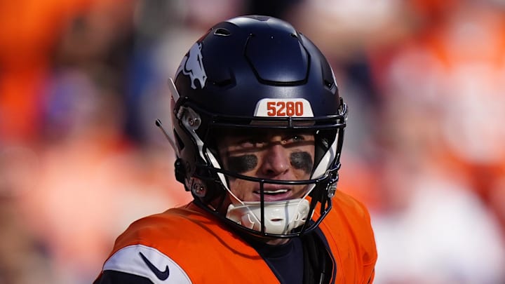 Dec 21, 2025; Denver, Colorado, USA; Denver Broncos quarterback Bo Nix (10) during the first half  at Empower Field at Mile High. Mandatory Credit: Ron Chenoy-Imagn Images