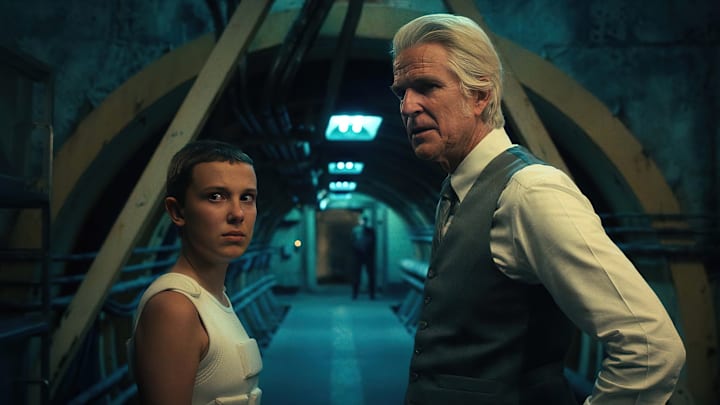 STRANGER THINGS. (L to R) Millie Bobby Brown as Eleven and Matthew Modine as Dr. Martin Brenner in STRANGER THINGS. Cr. Courtesy of Netflix © 2022