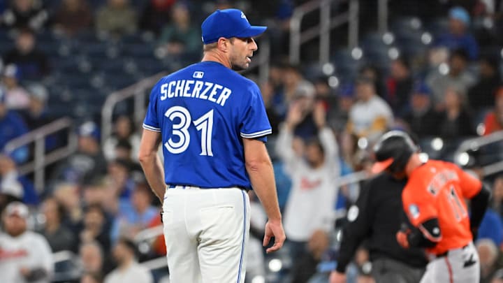Mar 29, 2025; Toronto, Ontario, CAN; Toronto Blue Jays pitcher Max Scherzer (31) waits for a new ball as Baltimore Orioles second baseman Jordan Westburg (11) rounds the bases after hitting a solo home run in the first inning at Rogers Centre. 