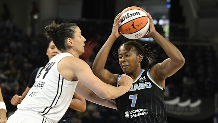 Aug 15, 2025; Chicago, Illinois, USA;  Golden State Valkyries forward Cecilia Zandalasini (24) defends against Chicago Sky guard Ariel Atkins (7) during the first half at Wintrust Arena. Mandatory Credit: Matt Marton-Imagn Images