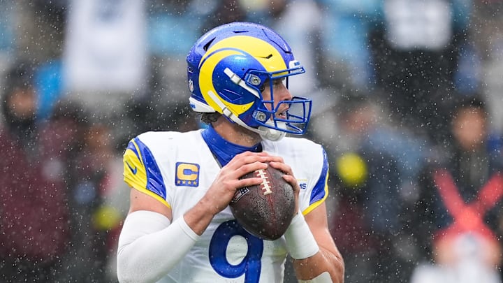 Nov 30, 2025; Charlotte, North Carolina, USA; Los Angeles Rams quarterback Matthew Stafford (9) looks to pass during the fourth quarter against the Carolina Panthers at Bank of America Stadium. Mandatory Credit: Jim Dedmon-Imagn Images