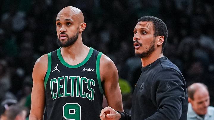 Apr 28, 2026; Boston, Massachusetts, USA; Boston Celtics head coach Joe Mazzulla talks with guard Derrick White (9) from the sideline as they take on the Philadelphia 76ers during game five of the first round of the 2026 NBA Playoffs at TD Garden. Mandatory Credit: David Butler II-Imagn Images