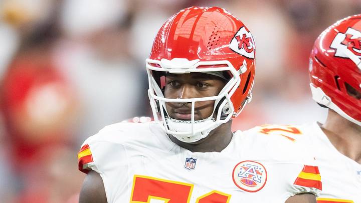 Aug 9, 2025; Glendale, Arizona, USA; Kansas City Chiefs offensive tackle Josh Simmons (71) against the Arizona Cardinals during a preseason NFL game at State Farm Stadium. Mandatory Credit: Mark J. Rebilas-Imagn Images