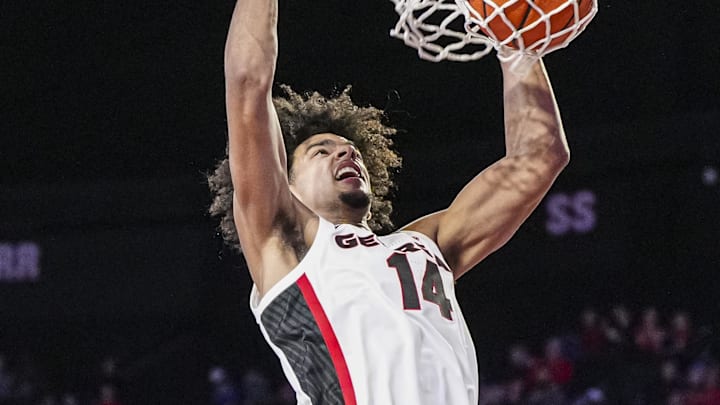 Nov 19, 2024; Athens, Georgia, USA; Georgia Bulldogs forward Asa Newell (14) dunks against the Alabama A&M Bulldogs during the first half at Stegeman Coliseum. Mandatory Credit: Dale Zanine-Imagn Images