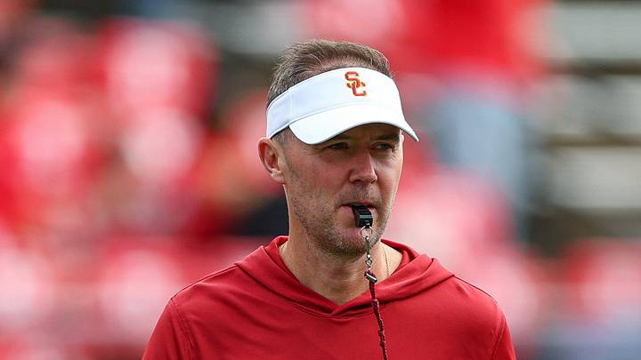 Sep 19, 2026; Piscataway, New Jersey, USA; USC Trojans head coach Lincoln Riley on the field during warm ups before the game against the Rutgers Scarlet Knights at SHI Stadium. Sep 19, 2026; Piscataway, New Jersey, USA; USC Trojans head coach Lincoln Riley on the field during warm ups before the game against the Rutgers Scarlet Knights at SHI Stadium.