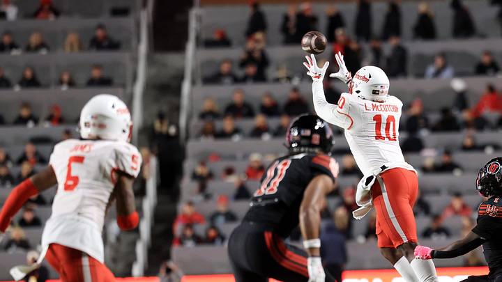 Oct 24, 2026; Salt Lake City, Utah, USA; Houston Cougars linebacker Latreveon McCutchin (10) intercepts a pass intended for Utah Utes running back Wayshawn Parker (1) during the fourth quarter at Rice-Eccles Stadium. Mandatory Credit: Rob Gray-Imagn Images Oct 24, 2026; Salt Lake City, Utah, USA; Houston Cougars linebacker Latreveon McCutchin (10) intercepts a pass intended for Utah Utes running back Wayshawn Parker (1) during the fourth quarter at Rice-Eccles Stadium. Mandatory Credit: Rob Gray-Imagn Images