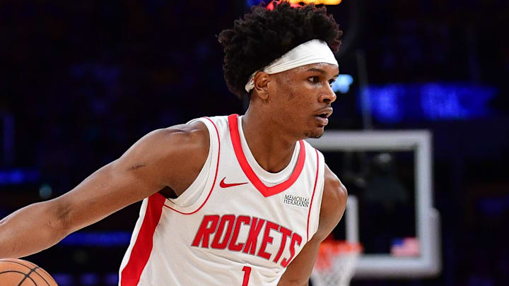 Apr 29, 2026; Los Angeles, California, USA; Houston Rockets guard Amen Thompson (1) moves the ball against the Los Angeles Lakers during the second half in game five of the first round of the 2026 NBA Playoffs at Crypto.com Arena. Mandatory Credit: Gary A. Vasquez-Imagn Images