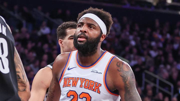 Jan 21, 2026; New York, New York, USA;  New York Knicks center Mitchell Robinson (23) stares at Brooklyn Nets center Nic Claxton (33) after a made basket in the second quarter at Madison Square Garden. Mandatory Credit: Wendell Cruz-Imagn Images