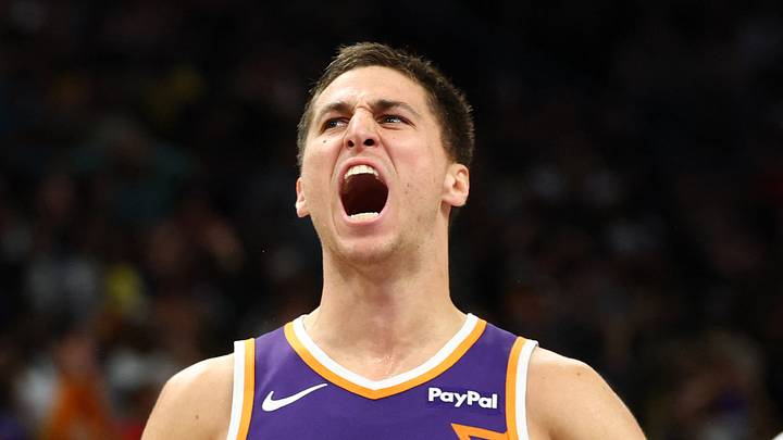 Phoenix, Arizona, USA; Phoenix Suns forward Royce O'Neale (00) celebrates with guard Collin Gillespie (12) against the Los Angeles Lakers in the second half at Mortgage Matchup Center on Feb 26, 2026.