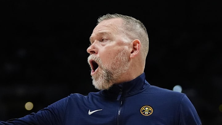 Apr 6, 2025; Denver, Colorado, USA; Denver Nuggets head coach Michael Malone reacts in the second half against the Indiana Pacers at Ball Arena. Mandatory Credit: Ron Chenoy-Imagn Images