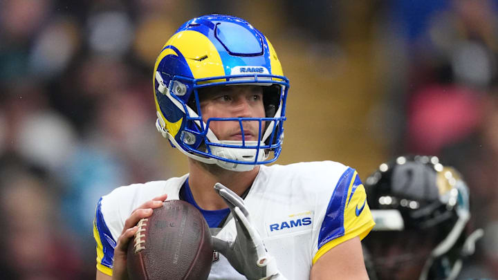Oct 19, 2025; London, United Kingdom; Los Angeles Rams quarterback Matthew Stafford (9) throws the ball against the Jacksonville Jaguars in the first half during a NFL International Series game at Wembley Stadium. Mandatory Credit: Kirby Lee-Imagn Images