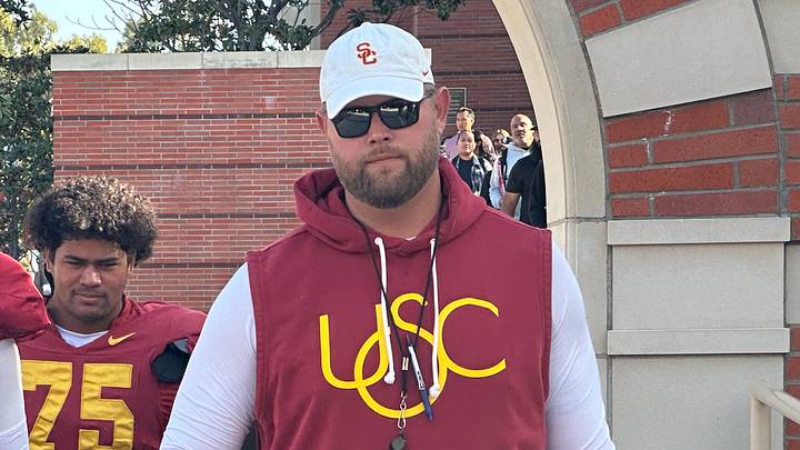 USC Trojans offensive line coach Zach Hanson and freshman offensive tackle Chase Deniz USC Trojans offensive line coach Zach Hanson and freshman offensive tackle Chase Deniz