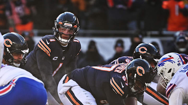 Dec 24, 2022; Chicago, Illinois, USA;  Chicago Bears quarterback Justin Fields (1) calls signals against the Buffalo Bills at Soldier Field. Mandatory Credit: Jamie Sabau-Imagn Images