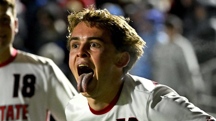 Dec 12, 2025; Cary, NC, USA; NC State Wolfpack midfielder Taig Healy (10) reacts after scoring a goal as defender Isaac Heffess (18) is in the background in the second half at First Horizon Stadium. Mandatory Credit: Bob Donnan-Imagn Images Dec 12, 2025; Cary, NC, USA; NC State Wolfpack midfielder Taig Healy (10) reacts after scoring a goal as defender Isaac Heffess (18) is in the background in the second half at First Horizon Stadium. Mandatory Credit: Bob Donnan-Imagn Images