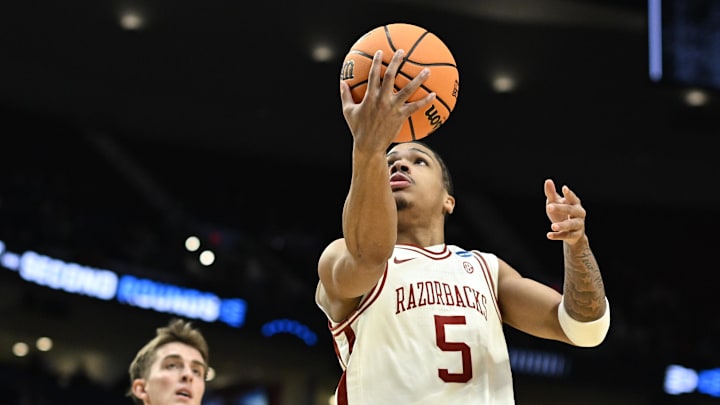 Arkansas Razorbacks guard Darius Acuff Jr. drives against Hawaii Rainbow Warriors in the first half during a first round game of the men's 2026 NCAA Tournament at Moda Center.