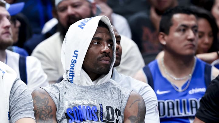 Mar 1, 2025; Dallas, Texas, USA;  Dallas Mavericks guard Kyrie Irving (right) and Dallas Mavericks guard Klay Thompson (31) react on the bench against the Milwaukee Bucks during the second half at American Airlines Center. Mandatory Credit: Kevin Jairaj-Imagn Images