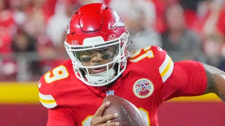 Aug 22, 2025; Kansas City, Missouri, USA; Kansas City Chiefs quarterback Chris Oladokun (19) runs the ball against the Chicago Bears during the game at GEHA Field at Arrowhead Stadium. Mandatory Credit: Denny Medley-Imagn Images