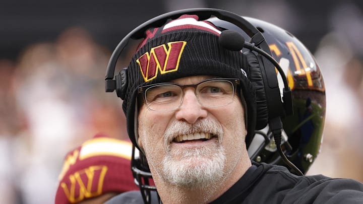 Dec 1, 2024; Landover, Maryland, USA; Washington Commanders head coach Dan Quinn (right) celebrates with Commanders running back Brian Robinson Jr. (8) after scoring a touchdown against the Tennessee Titans during the first half at Northwest Stadium. Mandatory Credit: Amber Searls-Imagn Images