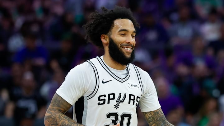 Mar 17, 2026; Sacramento, California, USA; San Antonio Spurs forward Julian Champagnie (30) celebrates after scoring during the third quarter against the Sacramento Kings at Golden 1 Center. Mandatory Credit: Sergio Estrada-Imagn Images