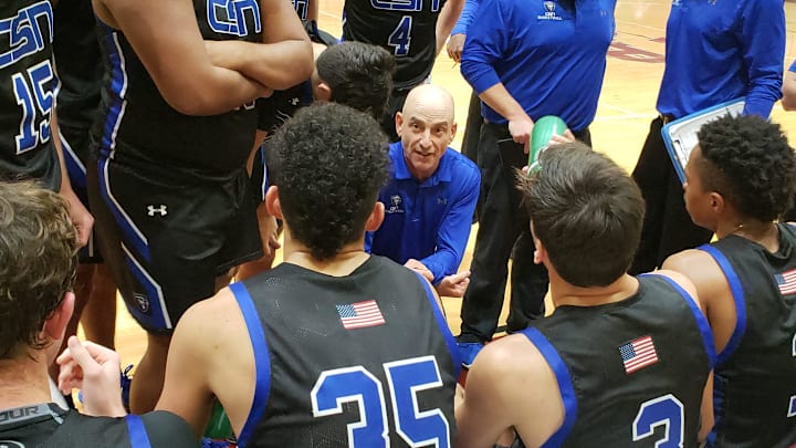 Community School of Naples boys basketball coach Greg Donahue talks to his team during a timeout in a game at First Baptist Academy on Friday, Jan. 10, 2020. CSN won 48-38 to extend its winning streak to 12 games.

CSN Donahue