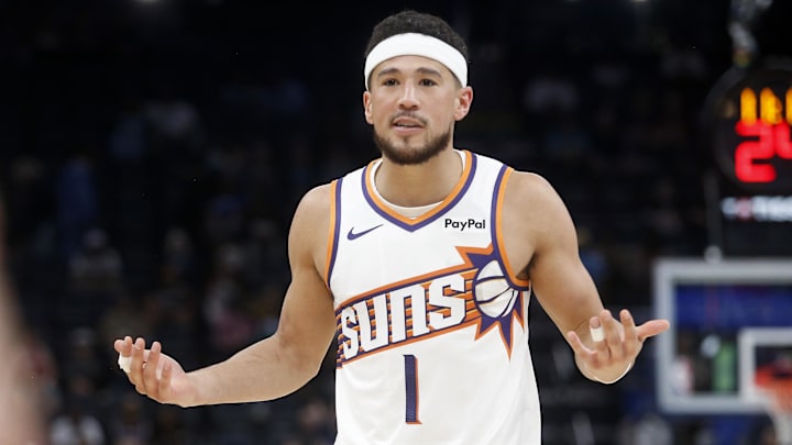 Mar 30, 2026; Memphis, Tennessee, USA; Phoenix Suns guard Devin Booker (1) reacts during the third quarter against the Memphis Grizzlies at FedExForum. Mandatory Credit: Petre Thomas-Imagn Images