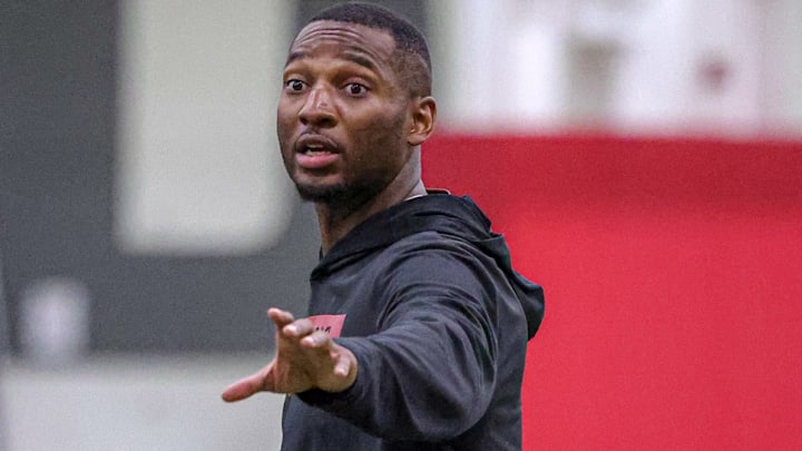 Arkansas Razorbacks secondary coach Nick Perry during preseason camp drills Tuesday at the indoor practice center in Fayetteville, Ark. Arkansas Razorbacks secondary coach Nick Perry during preseason camp drills Tuesday at the indoor practice center in Fayetteville, Ark.