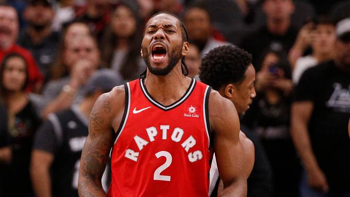 Jan 3, 2019; San Antonio, TX, USA; Toronto Raptors small forward Kawhi Leonard (2) reacts after drawing a foul after scoring a basket against the San Antonio Spurs during the first half at AT&T Center. Mandatory Credit: Soobum Im-USA TODAY Sports