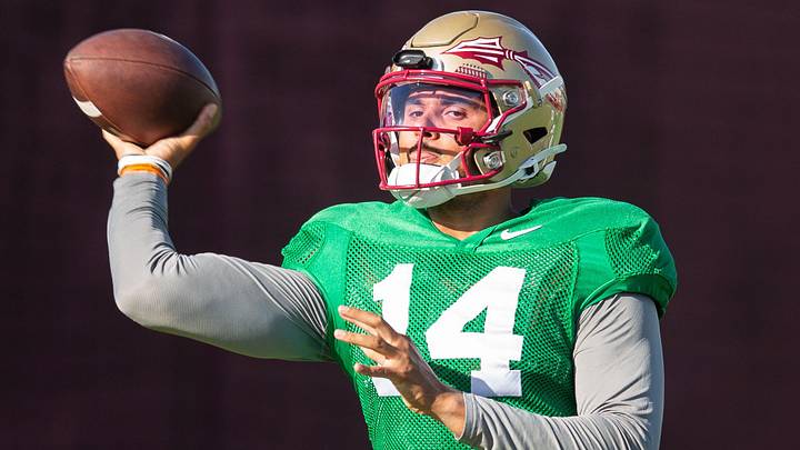 Florida State Seminoles quarterback Ashton Daniels (14) winds up to pass Thursday, April 9, 2026. Florida State Seminoles quarterback Ashton Daniels (14) winds up to pass Thursday, April 9, 2026.