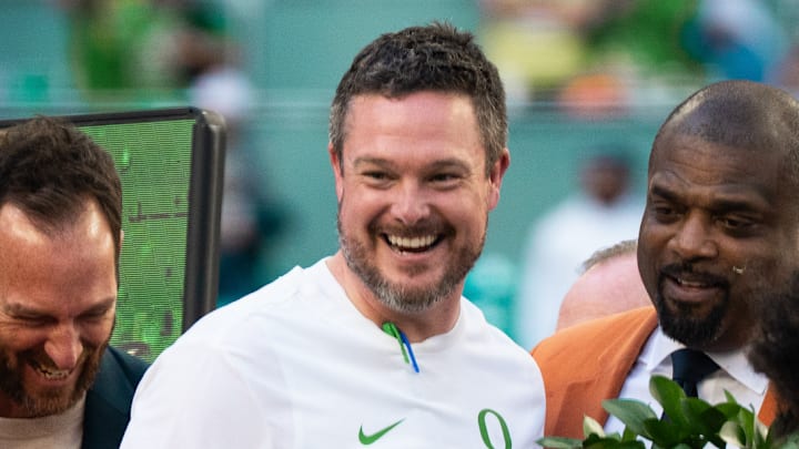 oregon ducks NIL Name image likeness nike uniform phil knight dan lanning nfl dante moore college football playoff rece davis