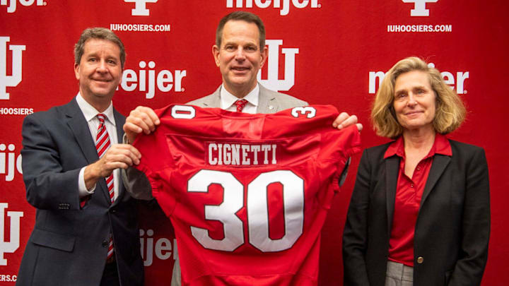Indiana athletic director Scott Dolson with football coach Curt Cignetti and IU president Pamela Whitten at Cignetti's introductory press conference. 