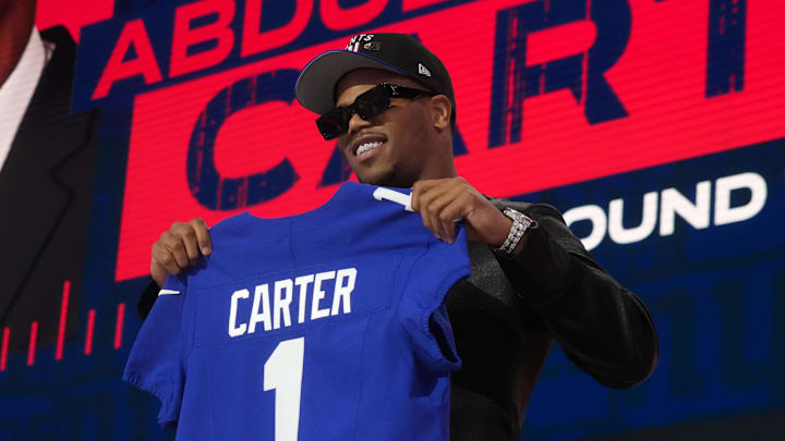 The Giants selecting Carter at No. 3 enabled them to trade back into the first round for quarterback Jaxson Dart later Thursday night.