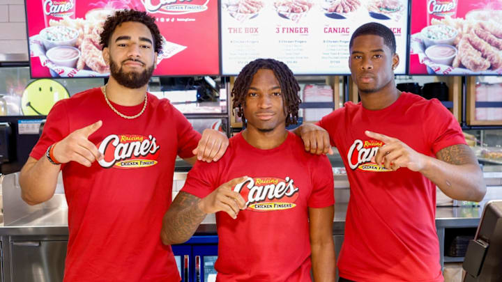 Indiana Hoosiers Elijah Sarratt, D’Angelo Ponds and Jamari Sharpe clock in for a “shift” at Raising Cane’s in Bloomington following their historic College Football Championship Indiana Hoosiers Elijah Sarratt, D’Angelo Ponds and Jamari Sharpe clock in for a “shift” at Raising Cane’s in Bloomington following their historic College Football Championship