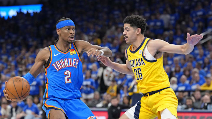 Jun 8, 2025; Oklahoma City, Oklahoma, USA; Oklahoma City Thunder guard Shai Gilgeous-Alexander (2) dribbles the ball against Indiana Pacers guard Ben Sheppard (26) during the second half during game two of the 2025 NBA Finals at Paycom Center. Mandatory Credit: Kyle Terada-Imagn Images