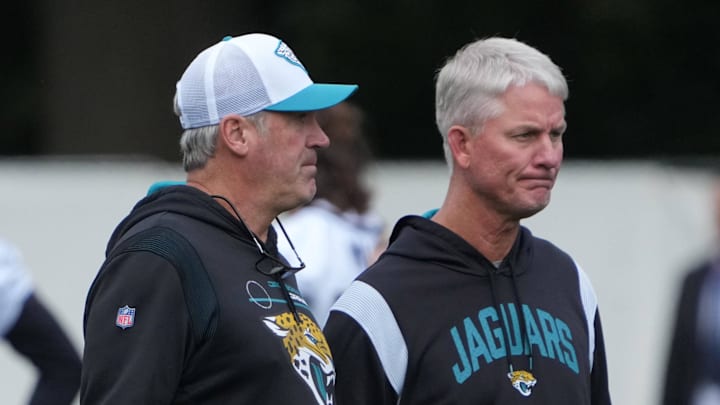 Oct 12, 2024; Watford, United Kingdom; Jacksonville Jaguars coach Doug Pederson and quarterbacks coach Mike McCoy during practice at The Grove. Mandatory Credit: Kirby Lee-Imagn Images