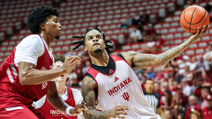 Indiana guard Lamar Wilkerson drives on forward Sam Alexis during the Cream and Crimson scrimmage Friday at Assembly Hall.