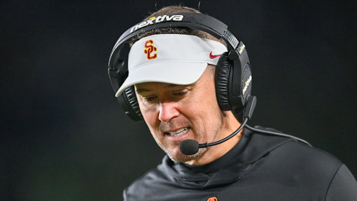 Oct 14, 2023; South Bend, Indiana, USA; USC Trojans head coach Lincoln Riley talks on his headset in the third quarter against the Notre Dame Fighting Irish at Notre Dame Stadium. 