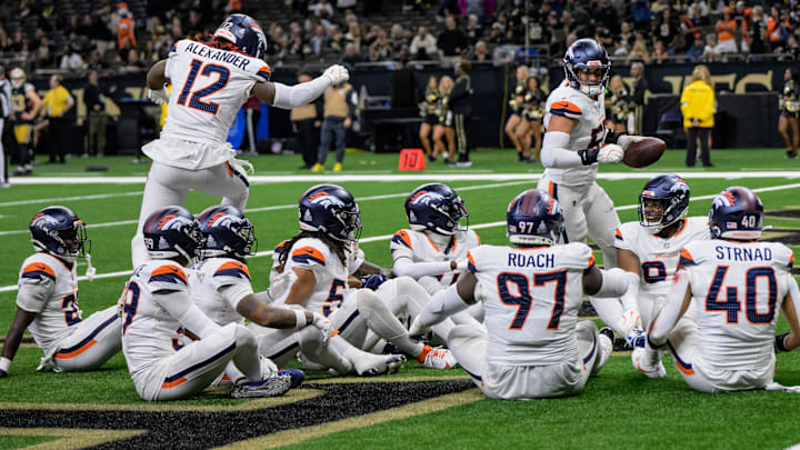 Oct 17, 2024; New Orleans, Louisiana, USA; Denver Broncos linebacker Cody Barton (55), standing right, celebrates running back an interception for a touchdown against New Orleans Saints quarterback Spencer Rattler with a duck, duck, goose celebration with his teammates during the fourth quarter at Caesars Superdome. Oct 17, 2024; New Orleans, Louisiana, USA; Denver Broncos linebacker Cody Barton (55), standing right, celebrates running back an interception for a touchdown against New Orleans Saints quarterback Spencer Rattler with a duck, duck, goose celebration with his teammates during the fourth quarter at Caesars Superdome.