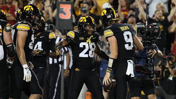 Sep 12, 2026; Iowa City, Iowa, USA; Iowa Hawkeyes quarterback Hank Brown (9) celebrates a touchdown with running back Kamari Moulton (28) against the Iowa State Cyclones during the second quarter at Kinnick Stadium. Mandatory Credit: Reese Strickland-Imagn Images Sep 12, 2026; Iowa City, Iowa, USA; Iowa Hawkeyes quarterback Hank Brown (9) celebrates a touchdown with running back Kamari Moulton (28) against the Iowa State Cyclones during the second quarter at Kinnick Stadium. Mandatory Credit: Reese Strickland-Imagn Images