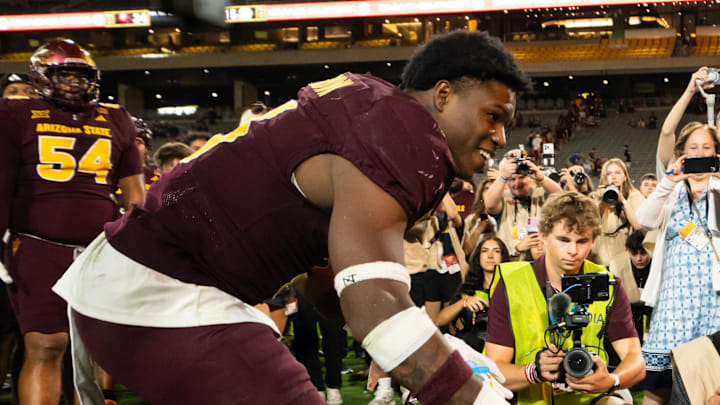 Sep 13, 2025; Tempe, Arizona, USA; Arizona State Sun Devils running back Raleek Brown (3) rings the victory bell after the game between Arizona State Sun Devils and Texas State Bobcats. Mandatory Credit: Arianna Grainey-Imagn Images