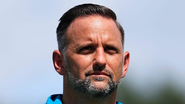 Jacksonville Jaguars defensive coordinator Anthony Campanile walks off the field to be interviewed by media members after an NFL training camp session at the Miller Electric Center, Thursday, Aug. 14, 2025 in Jacksonville, Fla.