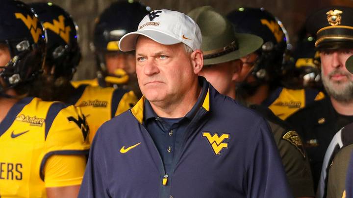 Sep 26, 2026; Morgantown, West Virginia, USA; West Virginia Mountaineers head coach Rich Rodriguez leads his team onto the field prior to their game against the Oklahoma State Cowboys at Milan Puskar Stadium. Mandatory Credit: Ben Queen-Imagn Images