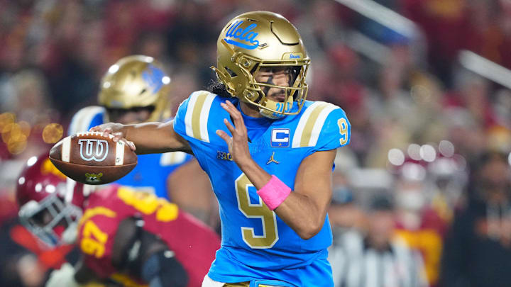 Nov 29, 2025; Los Angeles, California, USA; UCLA Bruins quarterback Nico Iamaleava (9) throws the ball against the Southern California Trojans in the first half at United Airlines Field at Los Angeles Memorial Coliseum. Mandatory Credit: Kirby Lee-Imagn Images