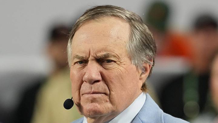 Jan 19, 2026; Miami Gardens, FL, USA; TV analyst Bill Belichick watches the Miami Hurricanes play the Indiana Hoosiers during the first half of the College Football Playoff National Championship game at Hard Rock Stadium. Mandatory Credit: Kirby Lee-Imagn Images