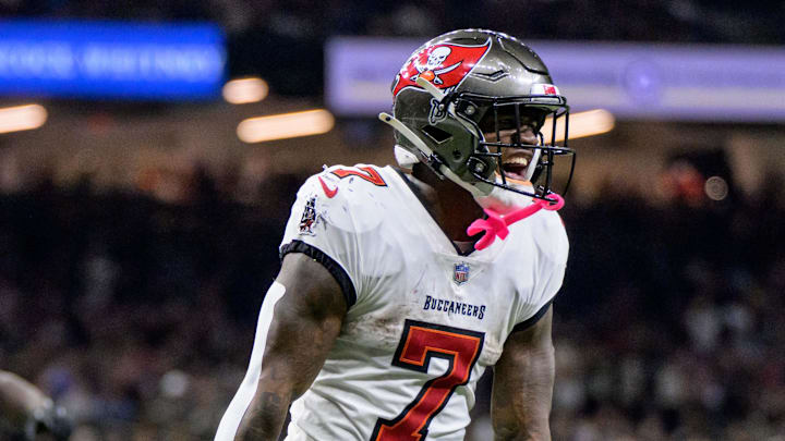 Oct 13, 2024; New Orleans, Louisiana, USA; Tampa Bay Buccaneers running back Bucky Irving (7) celebrates during the fourth quarter against the New Orleans Saints at Caesars Superdome. Mandatory Credit: Matthew Hinton-Imagn Images