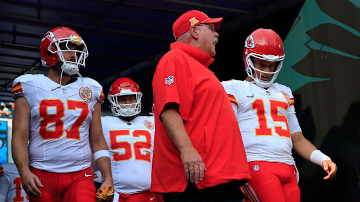 Kansas City Chiefs head coach Andy Reid, center, talks to quarterback Patrick Mahomes (15) next to tight end Travis Kelce (87) before a preseason NFL football game Saturday, Aug. 10, 2024 at EverBank Stadium in Jacksonville, Fla. The Jacksonville Jaguars defeated the Kansas City Chiefs 26-13. [Corey Perrine/Florida Times-Union]