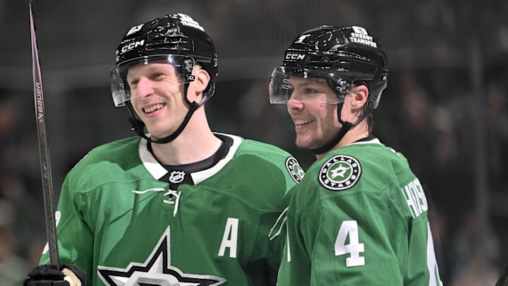 Jan 20, 2026; Dallas, Texas, USA;  Dallas Stars defenseman Esa Lindell (23) and defenseman Miro Heiskanen (4) celebrates a goal scored by Lindell against the Boston Bruins during the second period at the American Airlines Center. Mandatory Credit: Jerome Miron-Imagn Images