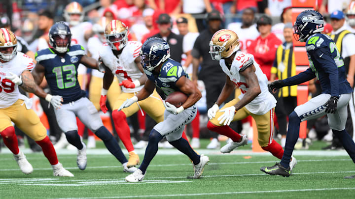 Sep 7, 2025; Seattle, Washington, USA; Seattle Seahawks cornerback Josh Jobe (29) runs the ball after intercepting the pass during the second half against San Francisco 49ers at Lumen Field.